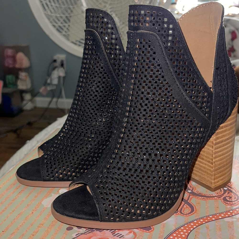 Boutique style peep toe booties.